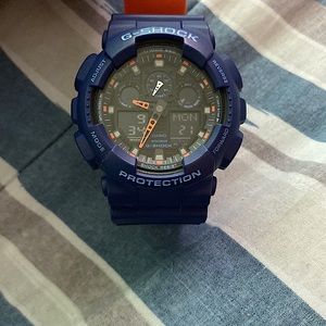 Blue and orange Casio G-shock watch